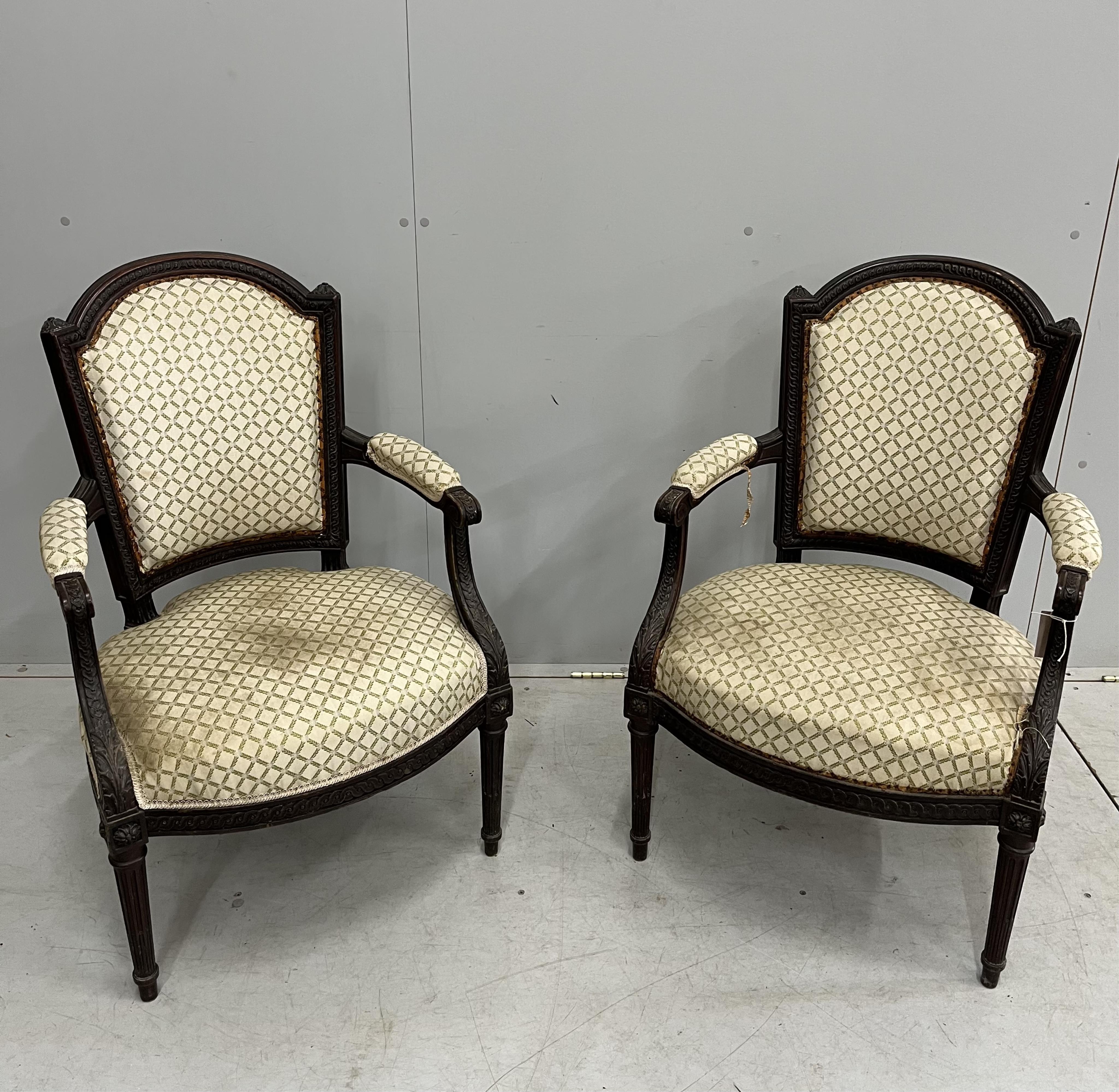 A pair of early 20th century mahogany fauteuil, width 59cm, depth 50cm, height 91cm